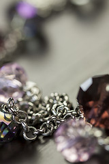 Image showing Attractive shiny purple beads on jewellery