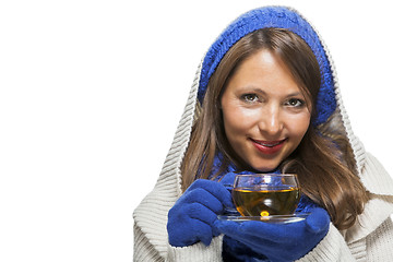 Image showing Fashionable young woman sipping hot tea