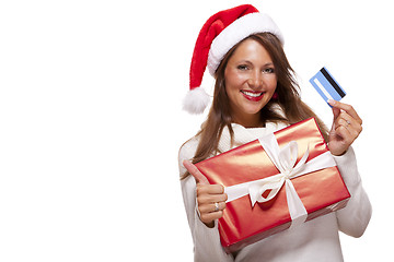 Image showing Smiling woman purchasing Christmas gifts