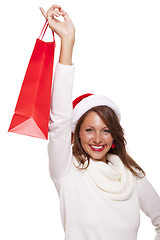 Image showing Happy vivacious Christmas shopper