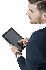 Image showing Businessman using a tablet computer