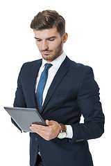 Image showing Businessman using a tablet computer