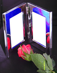 Image showing silver frame and red rose