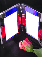 Image showing silver frame and red rose