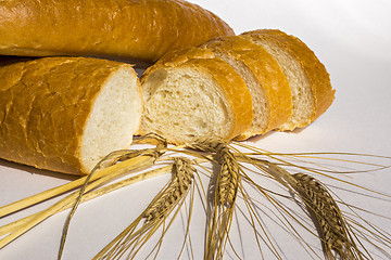 Image showing Loaf of white bread and wheat 