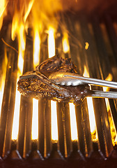Image showing T-bone on the BBQ