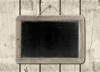 Image showing Blackboard on a white wood wall background