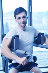 Image showing man running on the treadmill