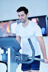 Image showing man running on the treadmill