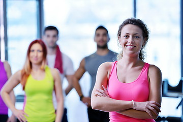 Image showing Group of people exercising at the gym