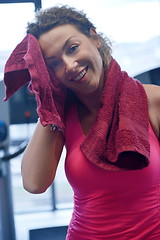 Image showing woman exercising on treadmill in gym