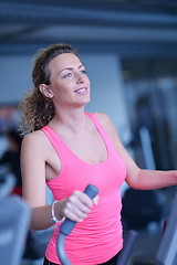 Image showing woman exercising on treadmill in gym