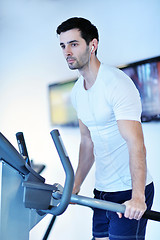 Image showing man running on the treadmill