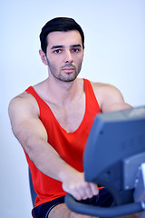 Image showing man running on the treadmill