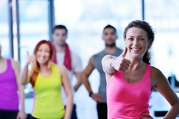 Image showing Group of people exercising at the gym