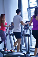 Image showing woman exercising on treadmill in gym