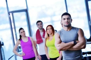 Image showing Group of people exercising at the gym