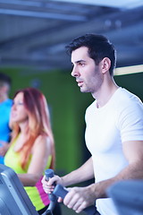 Image showing man running on the treadmill