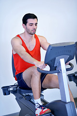 Image showing man running on the treadmill