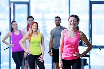 Image showing Group of people exercising at the gym