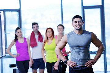 Image showing Group of people exercising at the gym