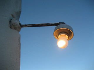 Image showing Old lamp on wall in early evening