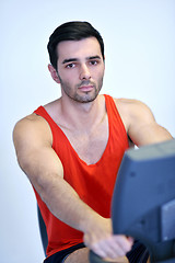 Image showing man running on the treadmill