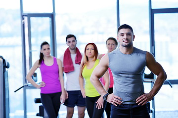 Image showing Group of people exercising at the gym