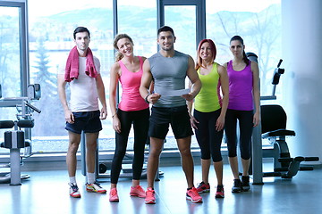 Image showing Group of people exercising at the gym