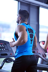 Image showing man running on the treadmill