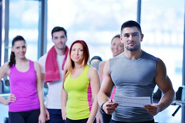 Image showing Group of people exercising at the gym