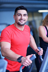 Image showing man running on the treadmill