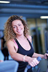 Image showing woman exercising on treadmill in gym