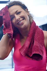 Image showing woman exercising on treadmill in gym