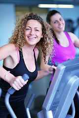 Image showing woman exercising on treadmill in gym