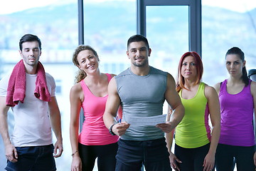 Image showing Group of people exercising at the gym