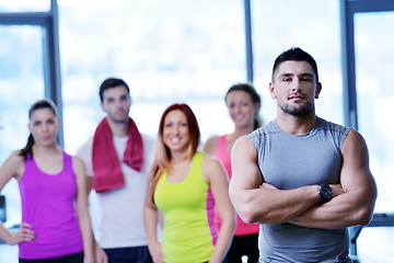 Image showing Group of people exercising at the gym