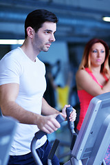 Image showing man running on the treadmill