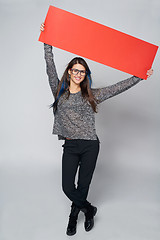 Image showing Woman holding red blank cardboard