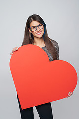 Image showing Woman holding big heart shape