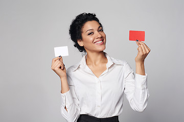 Image showing Business woman showing blank credit card