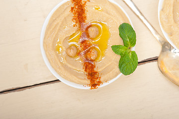 Image showing Hummus with mint on top