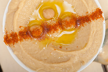 Image showing Hummus with mint on top
