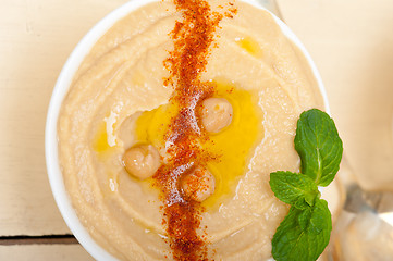 Image showing Hummus with mint on top