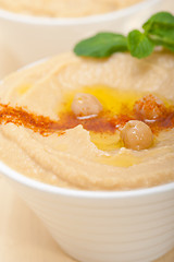 Image showing Hummus with mint on top