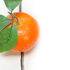 Image showing tangerine mandarin orange on white table