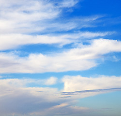 Image showing the sunrise in  colored sky white soft clouds and abstract backg