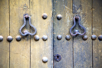 Image showing brown  morocco in africa the old  home and rusty safe padlock 