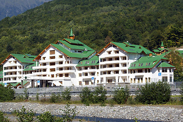 Image showing White house on the bank