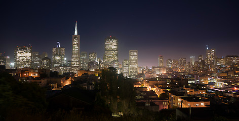 Image showing Beautiful Light Glows Over Neighborhood Homes Buildings San Fran